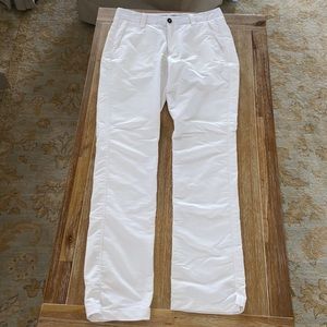 White under Armour golf pants.